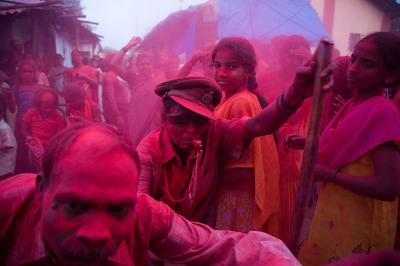 color photograph of Villagers celebrate the Ganapati Festival to honor the Lord Ganesh. Vadhav, India, 2007.