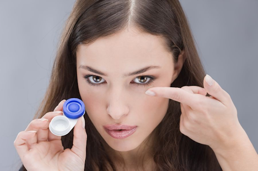 Girl Applying Contact Lenses