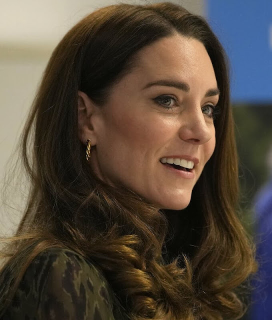 Kate Middleton wore a new army green leopard print chiffon midi dress by Derek Lam 10 Crosby. Asos gold plated earrings