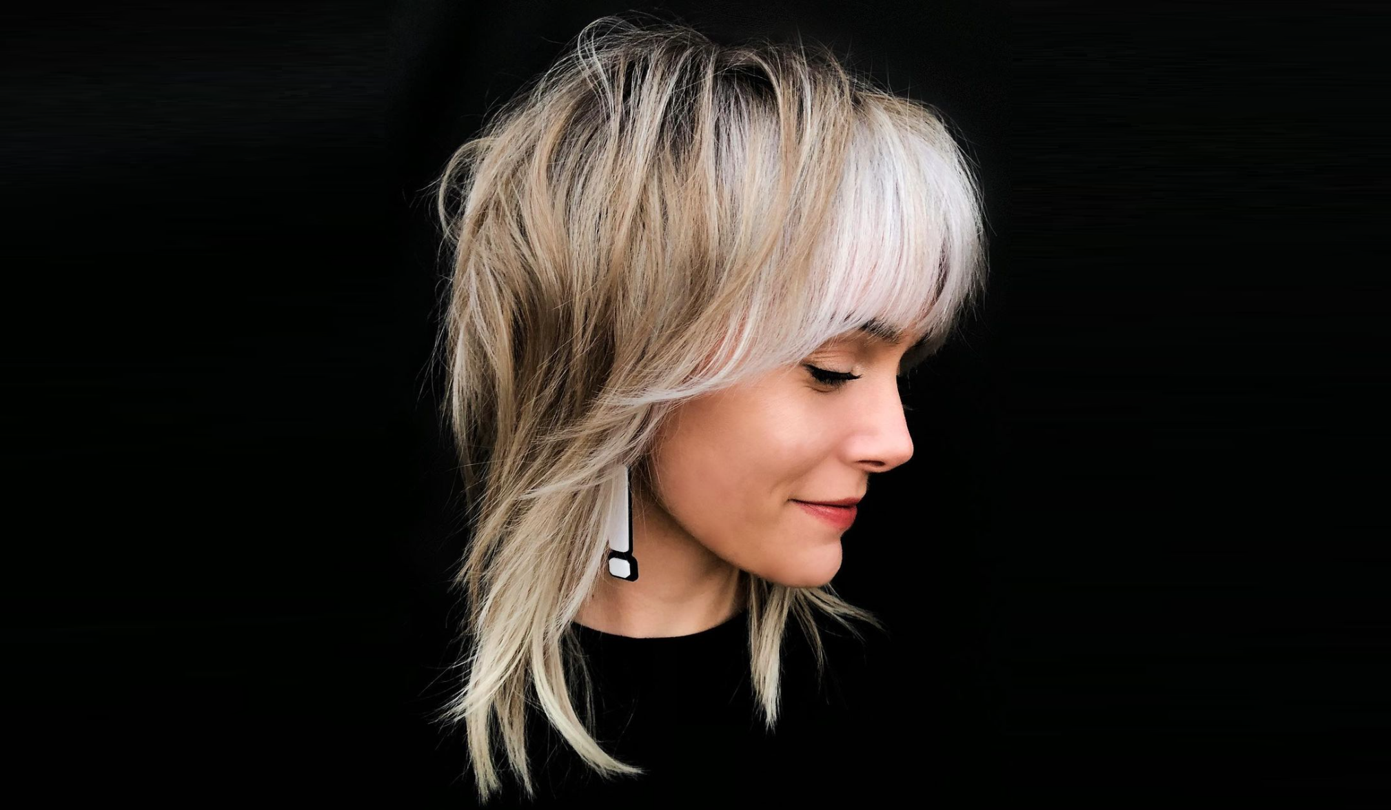 The wolf cut is one of the most versatile hairstyles. It works well for both round and square faces. The active layers make a look appear harmonious.