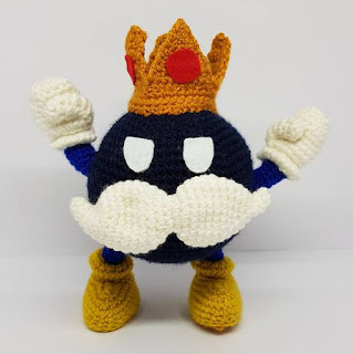 https://onescreativemind.com/freebie-friday-king-bob-omb-super-mario-crochet-pattern/