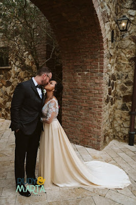 bride and groom kissing at bella collina
