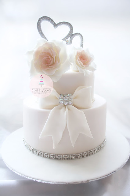 2 tier wedding cake fondant flowers heart hearts rings chucakes
