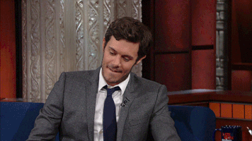 Adam Brody shrugging with the caption What Are You Gonna Do?