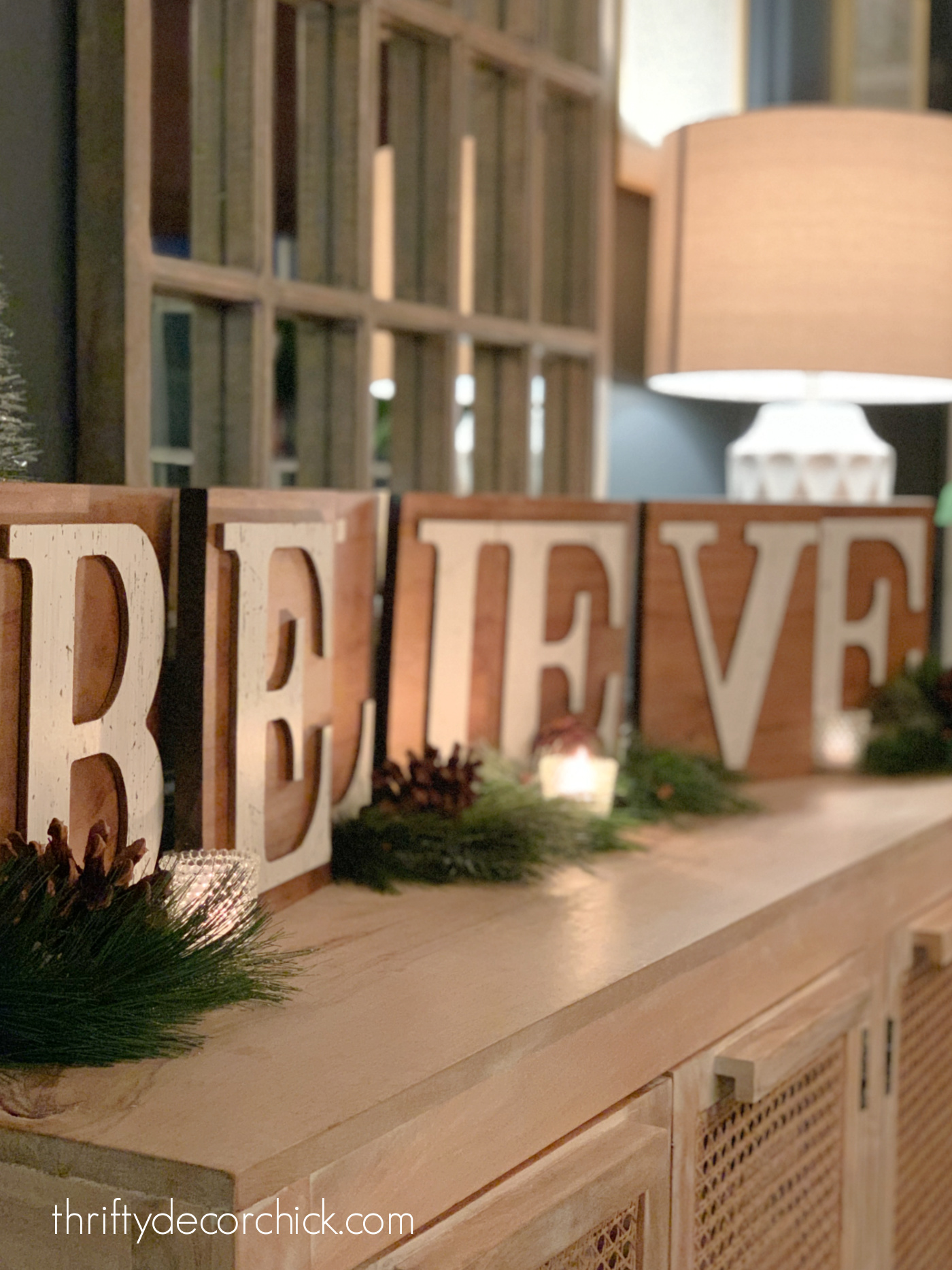 Believe letters on wood slices