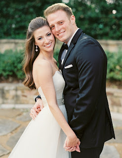 Greg McElroy with his wife Meredith Gray in their wedding dress
