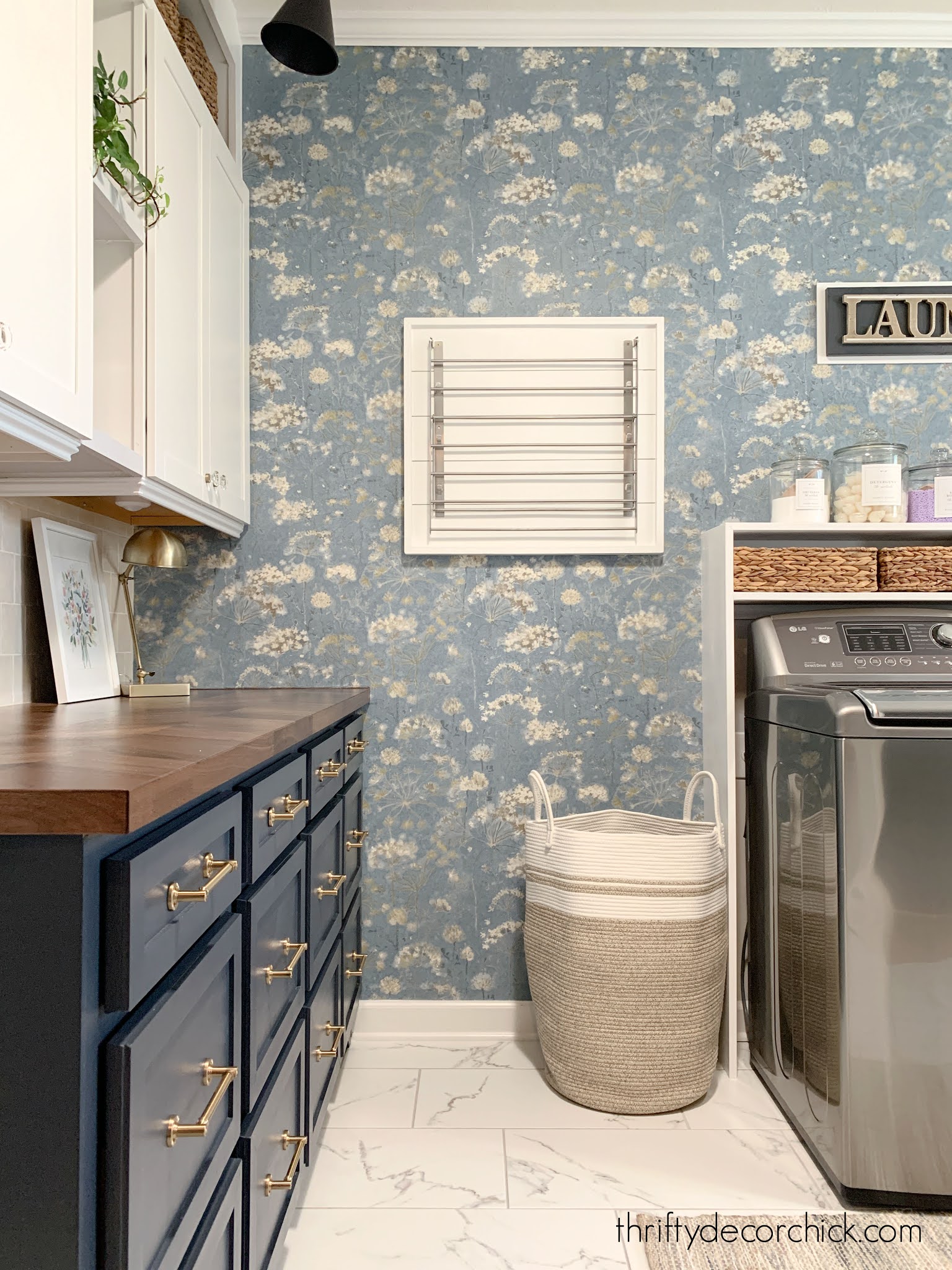 blue floral wallpaper in laundry room