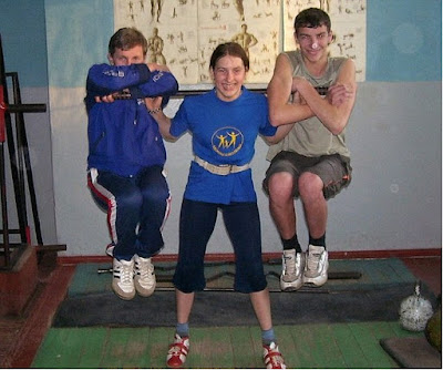 One of the strongest kids in the world is Varya Akulova as she lift two teenagers.