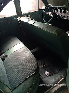 Back seat of 1966 Pontiac Tempest pulled from garage after 28 years.