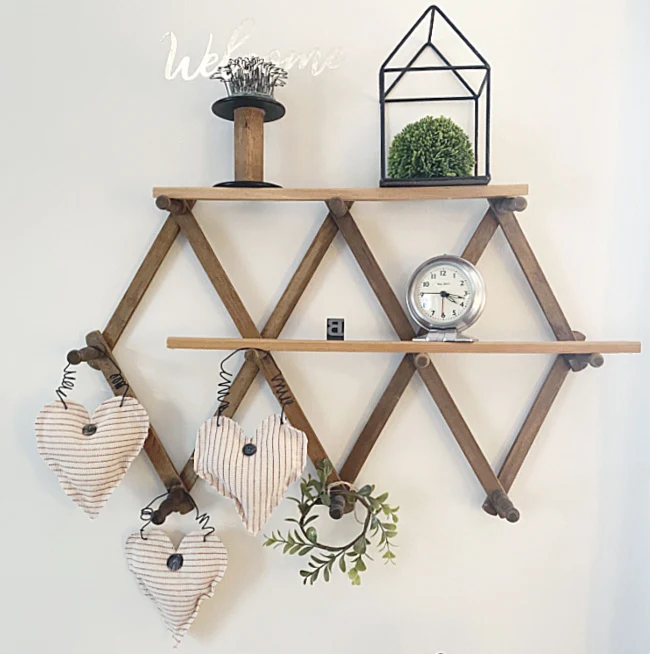 accordion peg shelf with hanging hearts and shelves