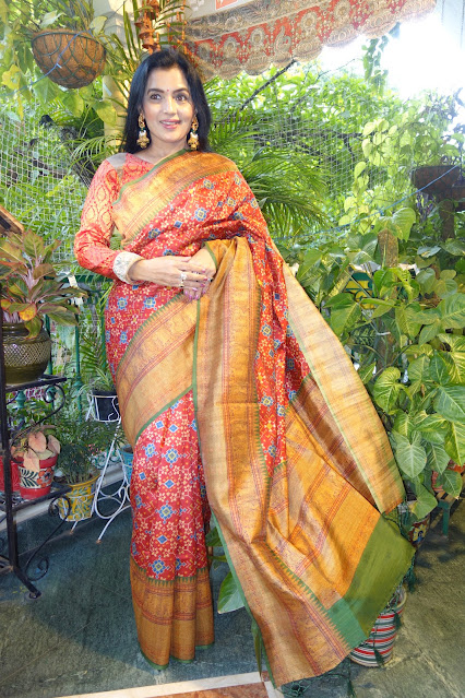 Red silk cotton, digital print Patola Navratan pattern body, and Kanjeewaram like border and pallu.