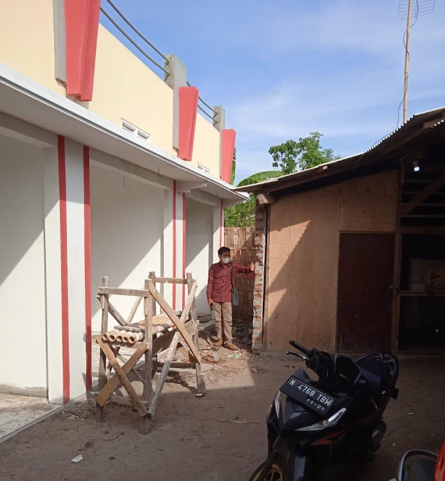 Diduga Tanpa Ijin, Bangunan Kios Milik Kepala Desa Jebol Tembok Pasar Nguling