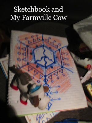 Sketchbook and My Farmville Cow - camping in Oregon - One of the Smartest decisions in my Entire life was to Explore Oregon after I retired from Work... Sleeping in the bucket seat of my Ford Windstar Van... Taking Pictures... Drawing Drawings... Listening to Jefferson Public Radio broadcast from the College in Eugene...