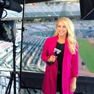 Picture of Kelly Crull while reporting