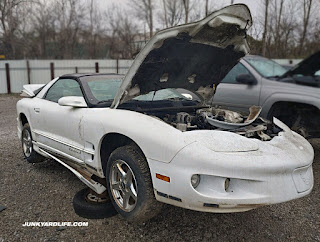 Junkyard of doom, the Pull-it yard: 1999 Pontiac Firebird with W68 Appearance Package.