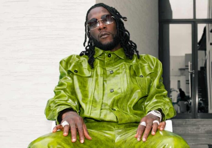 Burna boy replies woman who on twitter