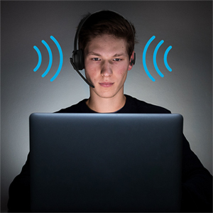 A person wearing the headset and looking at a laptop. There are blue lines around it.