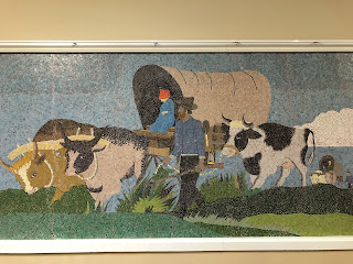 tile mural of pioneers