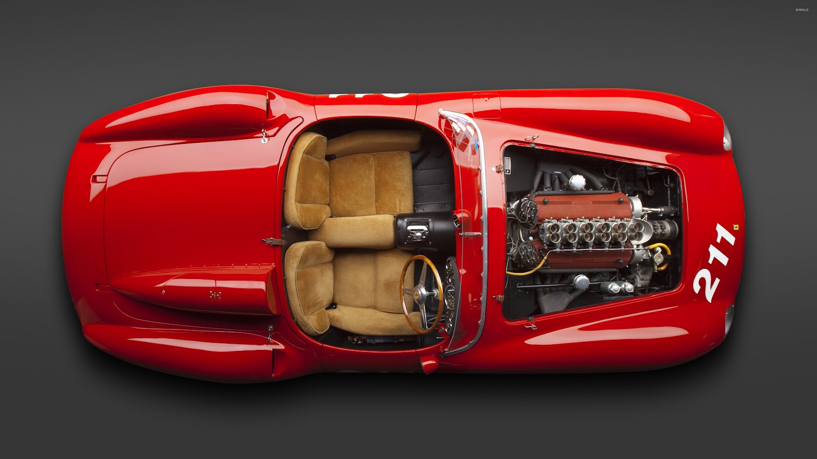 Download 4K iconic Ferrari 250 Testa Rossa wallpaper, featuring a top-down view of a vibrant red Ferrari 250 Testa Rossa with a luxurious tan interior and a detailed visible engine bay, emphasizing its classic racing heritage.