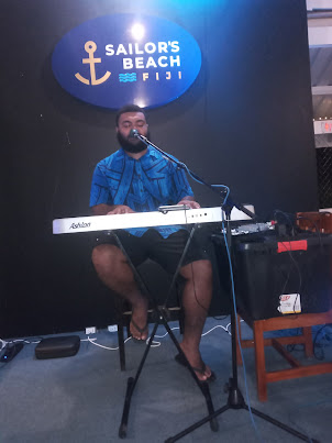 Freelance singer Mr Joseva Lesivakadua entertaining guests at "Sailor's Beach" hotel.