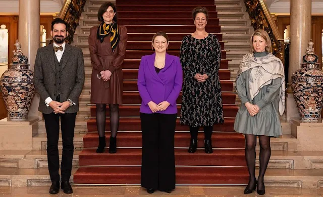 Crown Princess Stephanie wore a purple belinda side-button blazer from Ralph Lauren. Black trousers. Kultur lx