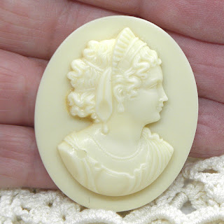 Vintage cameo brooch in plastic