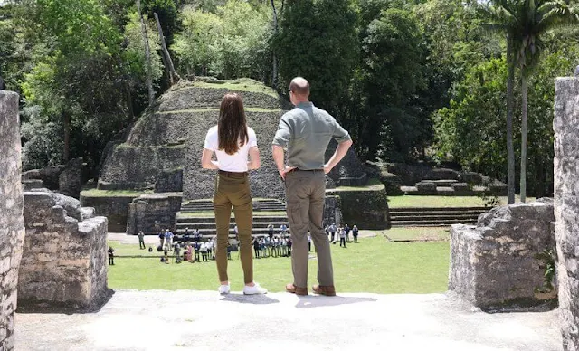 Kate Middleton wore khaki trousers from Dutch brand G-Star RAW, and white t-shirt by John Lewis, and white trainers by Superga