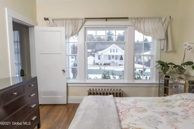 sears uriel visible through front window of sears crescent bedroom
