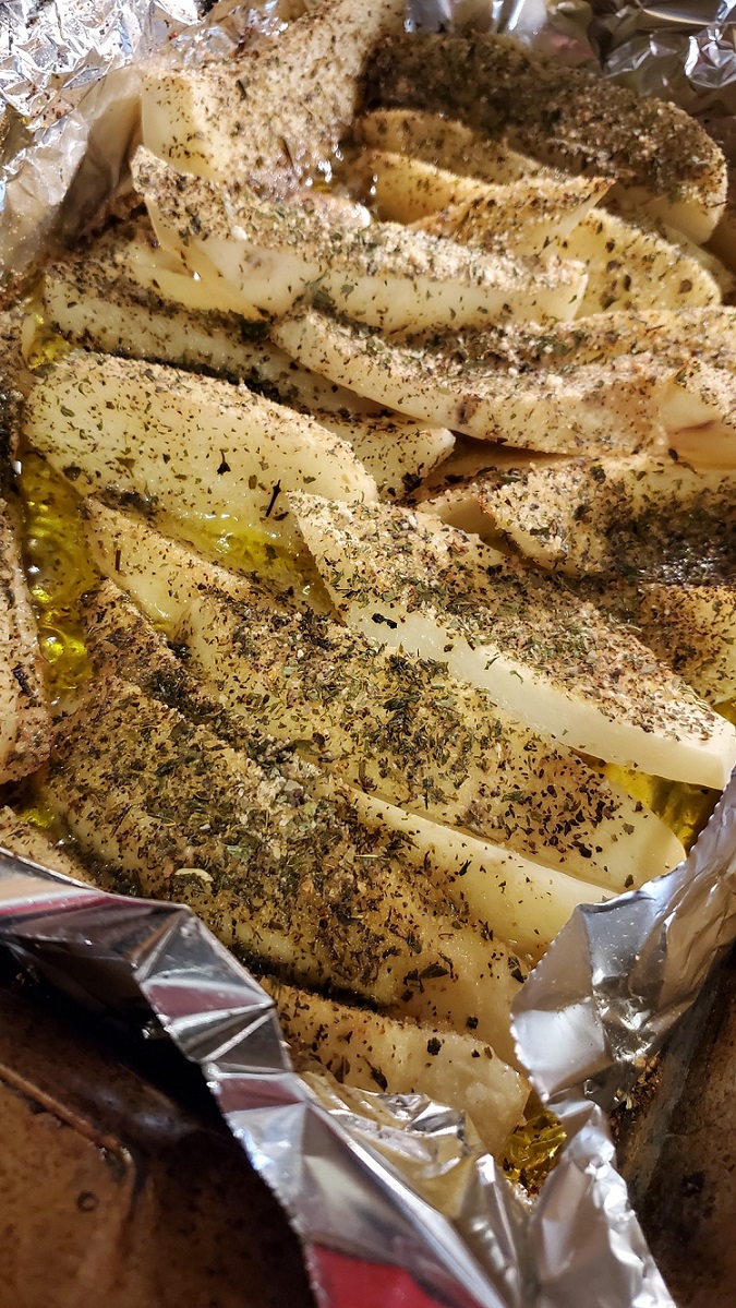 these are potato wedges with herbs and cheese