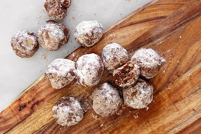 Mexican chocolate snowball cookies on board