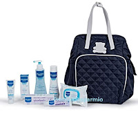 Concorso Vinci gratis Borsa fasciatoio con prodotti Mustela