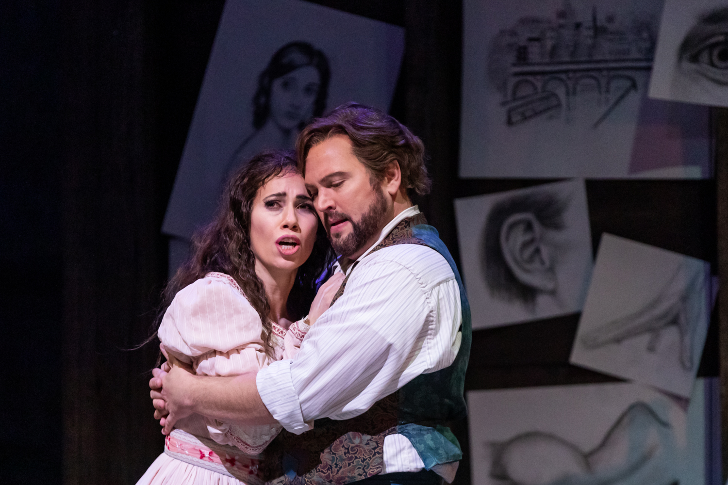 IN REVIEW: soprano LUCIA CESARONI as Mimì (left) and tenor SCOTT QUINN as Rodolfo (right) in North Carolina Opera's January 2022 production of Giacomo Puccini's LA BOHÈME [Photograph © by Eric Waters Photography]