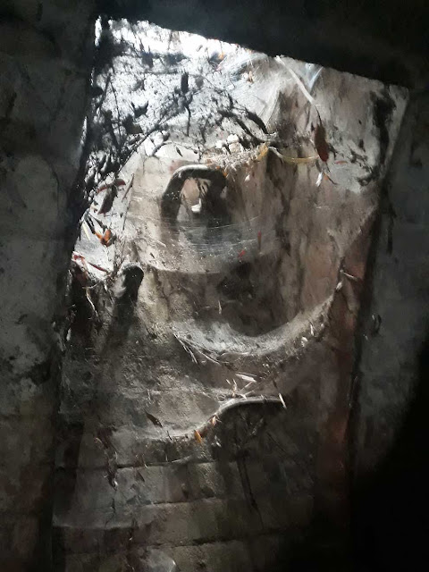 Unused manhole in underground tunnel