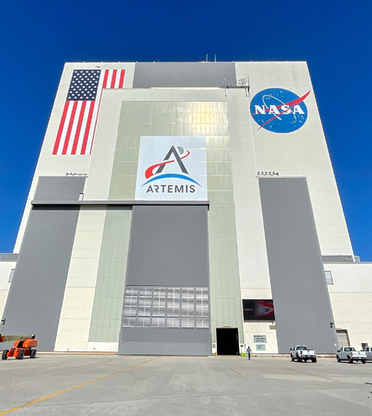 A low-angle view of the Vehicle Assembly Building at NASA's Kennedy Space Center in Florida.