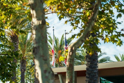 California flag and U.S. flag outdoors