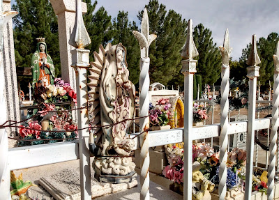 Blessed Mother Mary statues and mariachi statue in San Albino Cemetery 2021