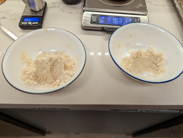 two bowls of sandy shortbread dough, the left one sandier than the right