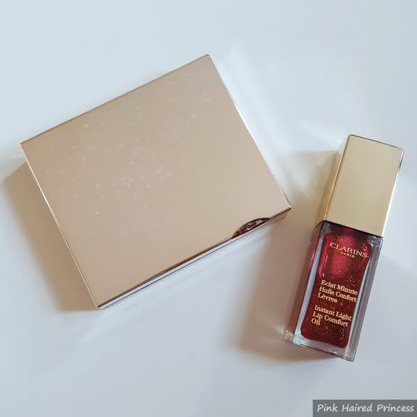 Clarins 2018 Christmas makeup collection, gold powder compact and red glitter lip oil