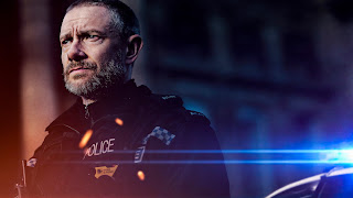 Martin Freeman dressed as a modern day police officer