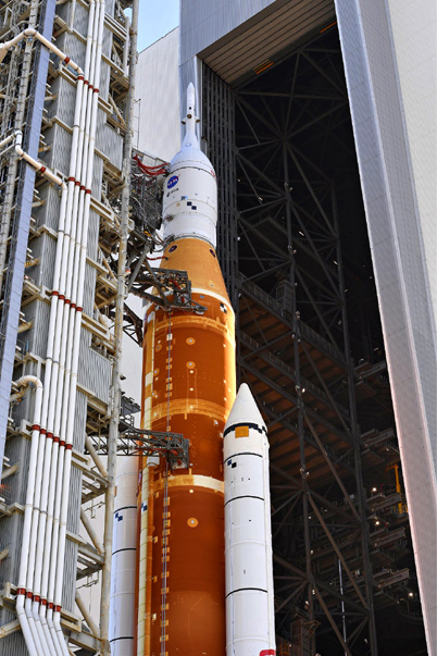 The Space Launch System rocket rolls out of the Vehicle Assembly Building for its journey to Launch Complex 39B at NASA's Kennedy Space Center in Florida...on March 17, 2022.
