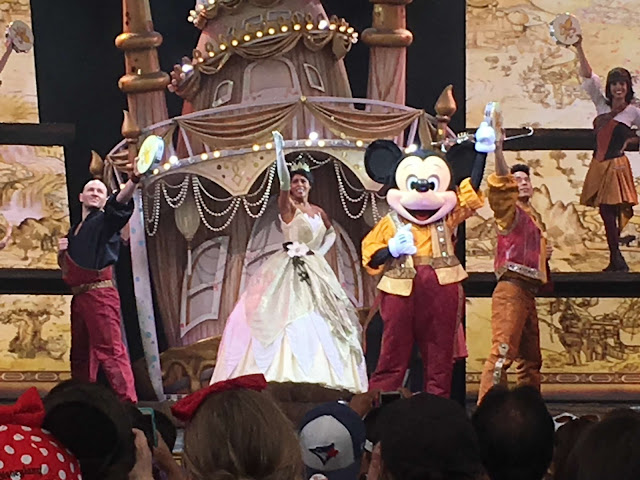 Mickey Mouse and Princess Tiana in Mickey and the Magical Map Finale Disneyland