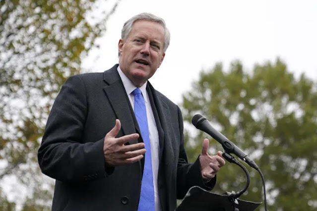 White House chief of staff Mark Meadows speaks with reporters outside the White House, Oct. 26, 2020, in Washington. Meadows, who as chief of staff to President Donald Trump promoted his lies of mass voter fraud, is facing increasing scrutiny about his own voter registration status. Public records show he is registered to vote in two states, including North Carolina, where he listed a mobile home he did not own, and may never have visited, as his legal residence weeks before casting a ballot in the 2020 election.