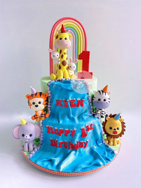 2 tier Safari Animals cake fondant rainbow waterfall giraffe bunny bunnies rabbit rabbits zebra tiger lion elephant chucakes