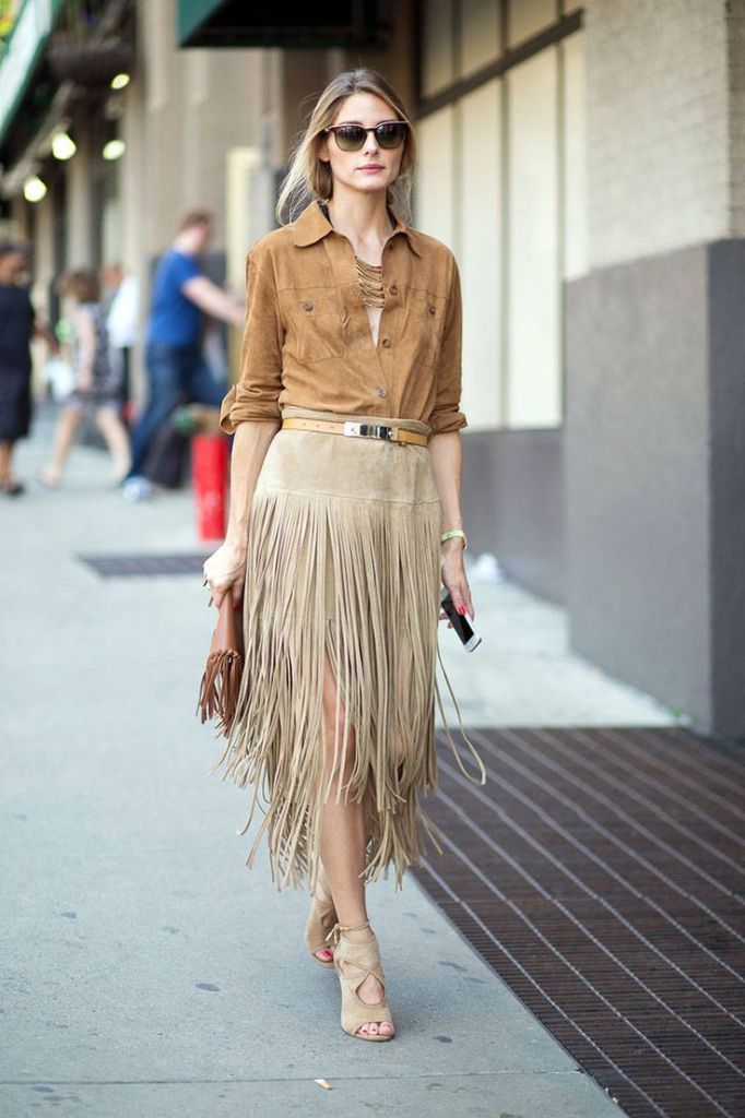 Girl wearing a fringed skirt