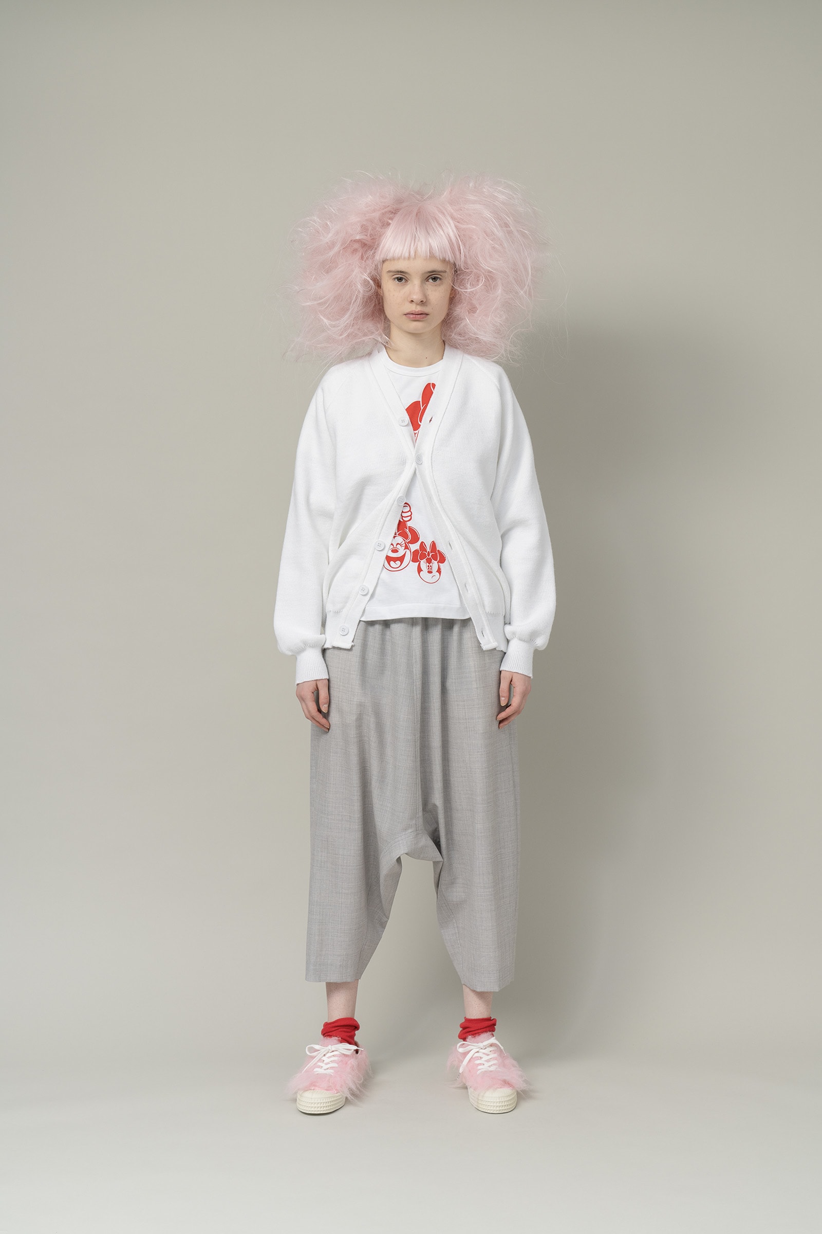 Image may contain COMME des GARÇONS GIRL Clothing Apparel Human Person Fashion Runway Long Sleeve and Sleeve