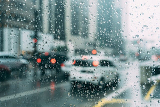 View from inside a car of a rainy street