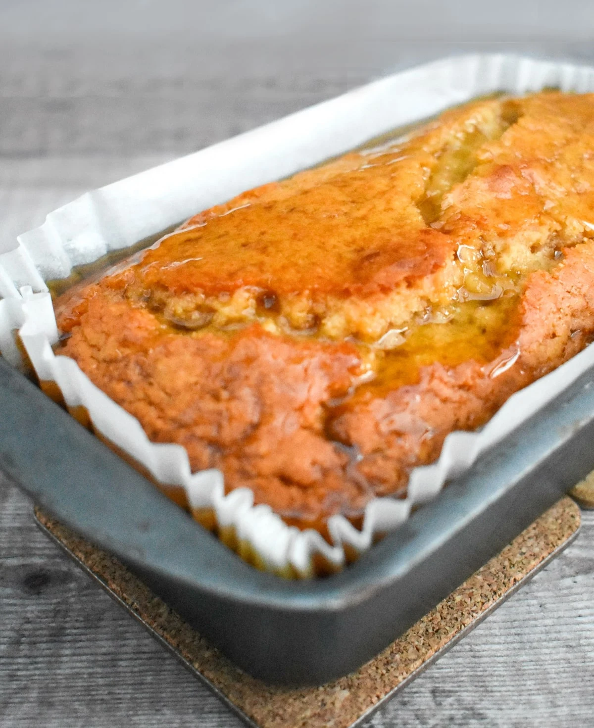 vegan golden syrup cake in a lined loaf tin