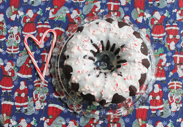 Food Lust People Love: This Chocolate Peppermint Bundt starts with a mint chocolate batter, baked up tender, finished with peppermint glaze and crushed peppermint candy canes, perfect flavors for the holiday season!