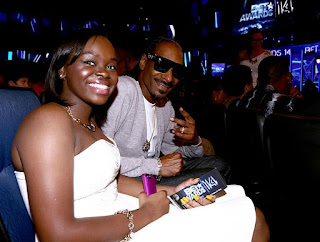 Cori Broadus with her dad Snoop Dogg