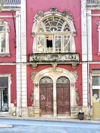 Porto Day Trips: Pair of dilapidated doors in Coimbra Portugal